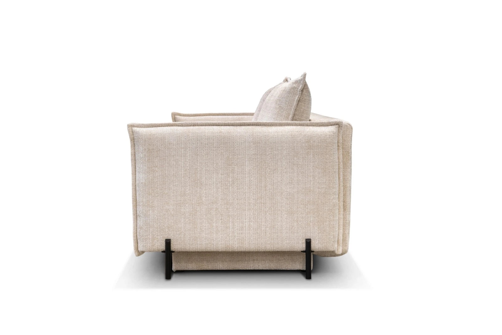 Vue latérale du canapé convertible AMALFI Marbella en tissu blanc cassé avec pieds noirs modernes